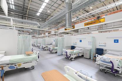 Nightingale ward with beds and curtains 2